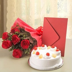 Hamper of cake, rose and greeting card